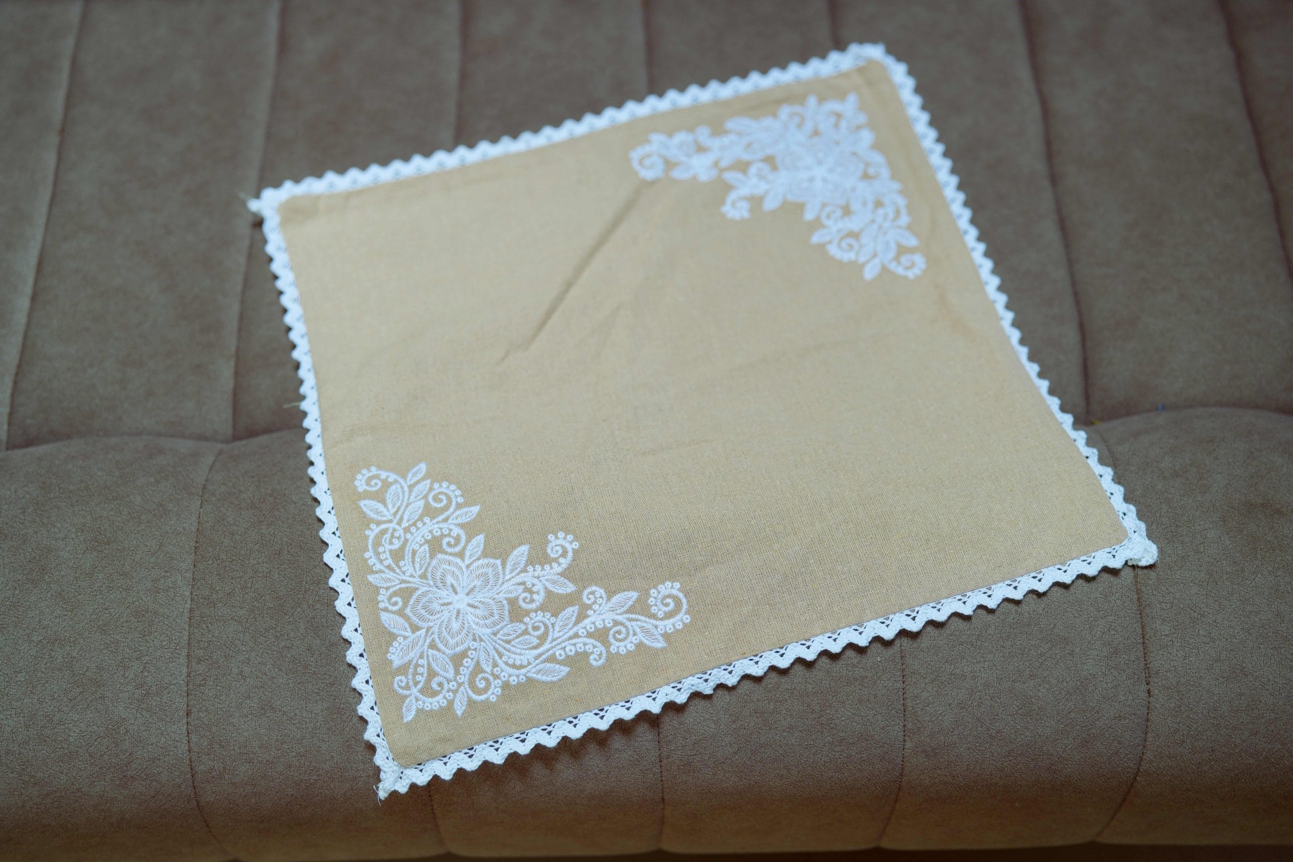 Caramel Charm Beige Corner-Embroidered Cushion